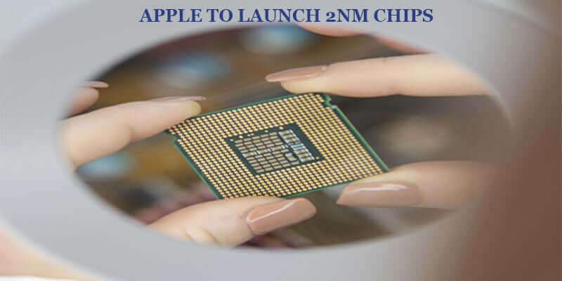 Close-up of a person holding a processor with text: APPLE TO LAUNCH 2NM CHIPS.
