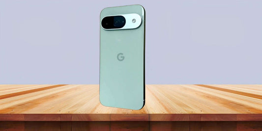 Google Pixel 9a showcased on a wooden surface, highlighting its sleek design and distinctive camera features.